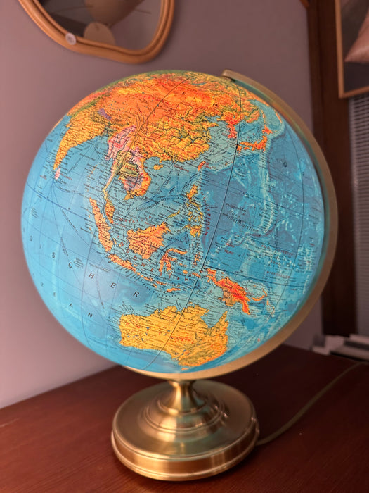 Vintage illuminated globe, globe gold