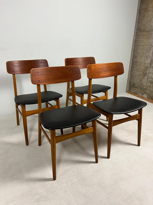 Vintage set of 4 teak chairs Farstrup black Denmark 60s